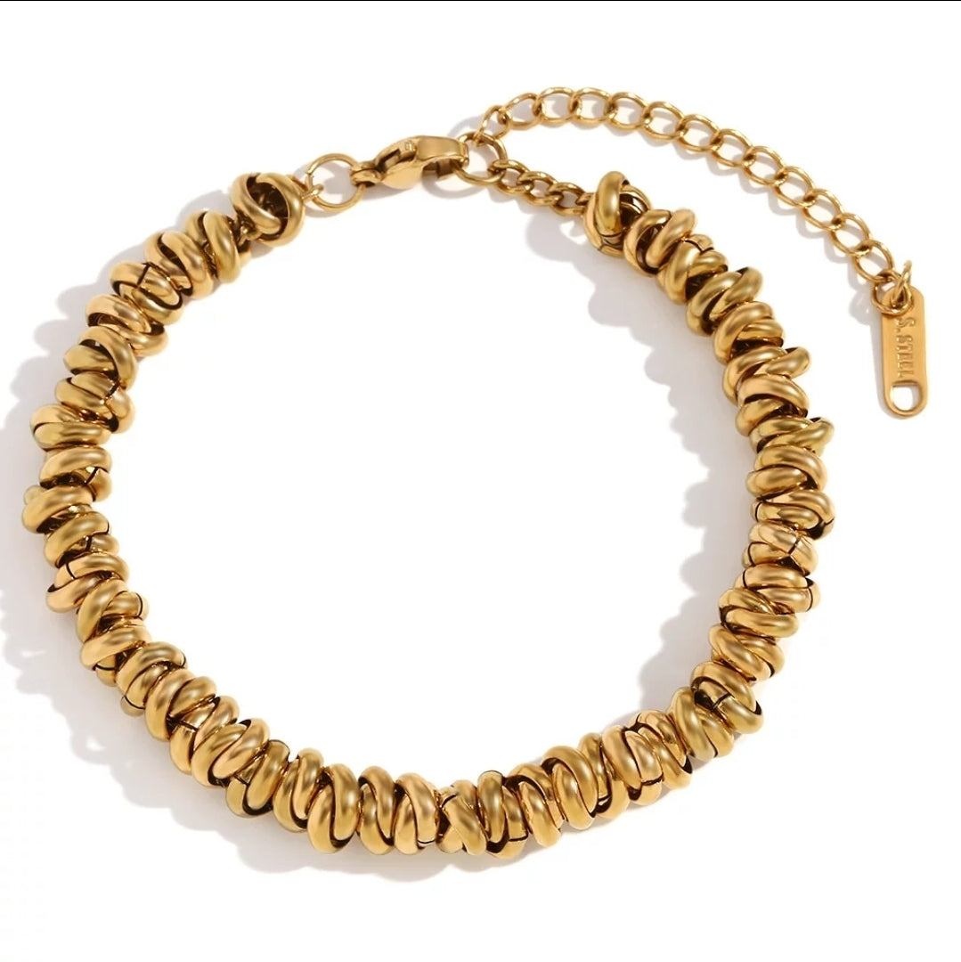 Glitze Accessories Sahara jewelry piece featuring intricate design and sparkling elements on a neutral background.
