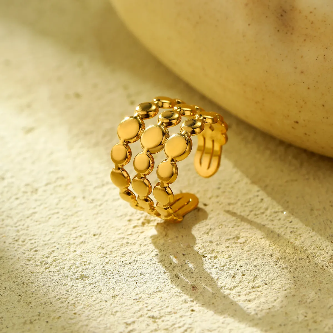 Bellure Glitze Accessories jewelry featuring colorful beads and intricate metal detailing, close-up of vibrant decorative pieces.