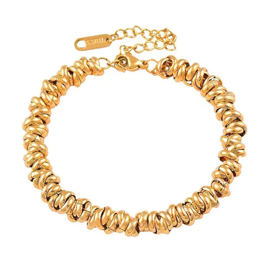 Glitze Accessories Sahara jewelry piece featuring intricate design and metallic finish, displayed on a neutral background.