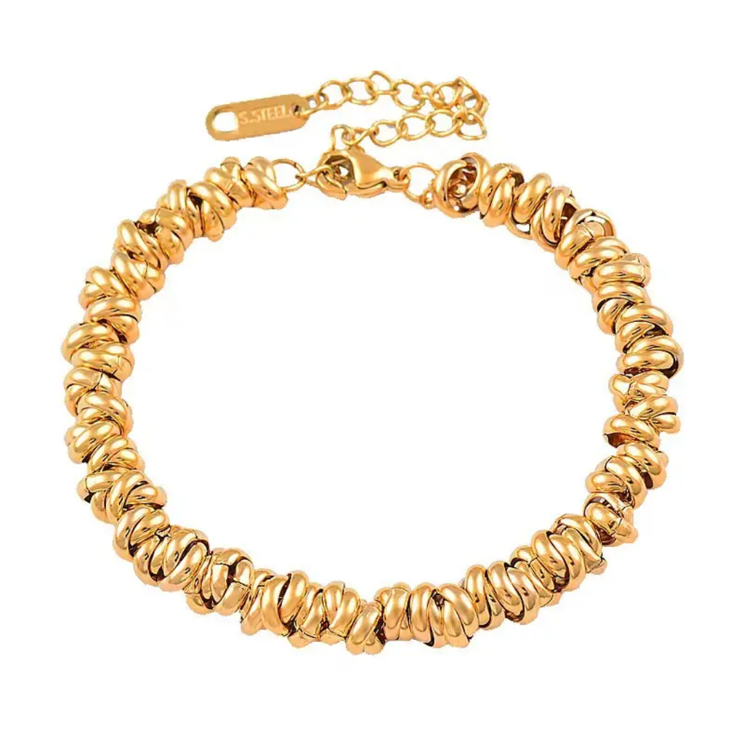 Glitze Accessories Sahara jewelry piece featuring intricate design and metallic finish, displayed on a neutral background.