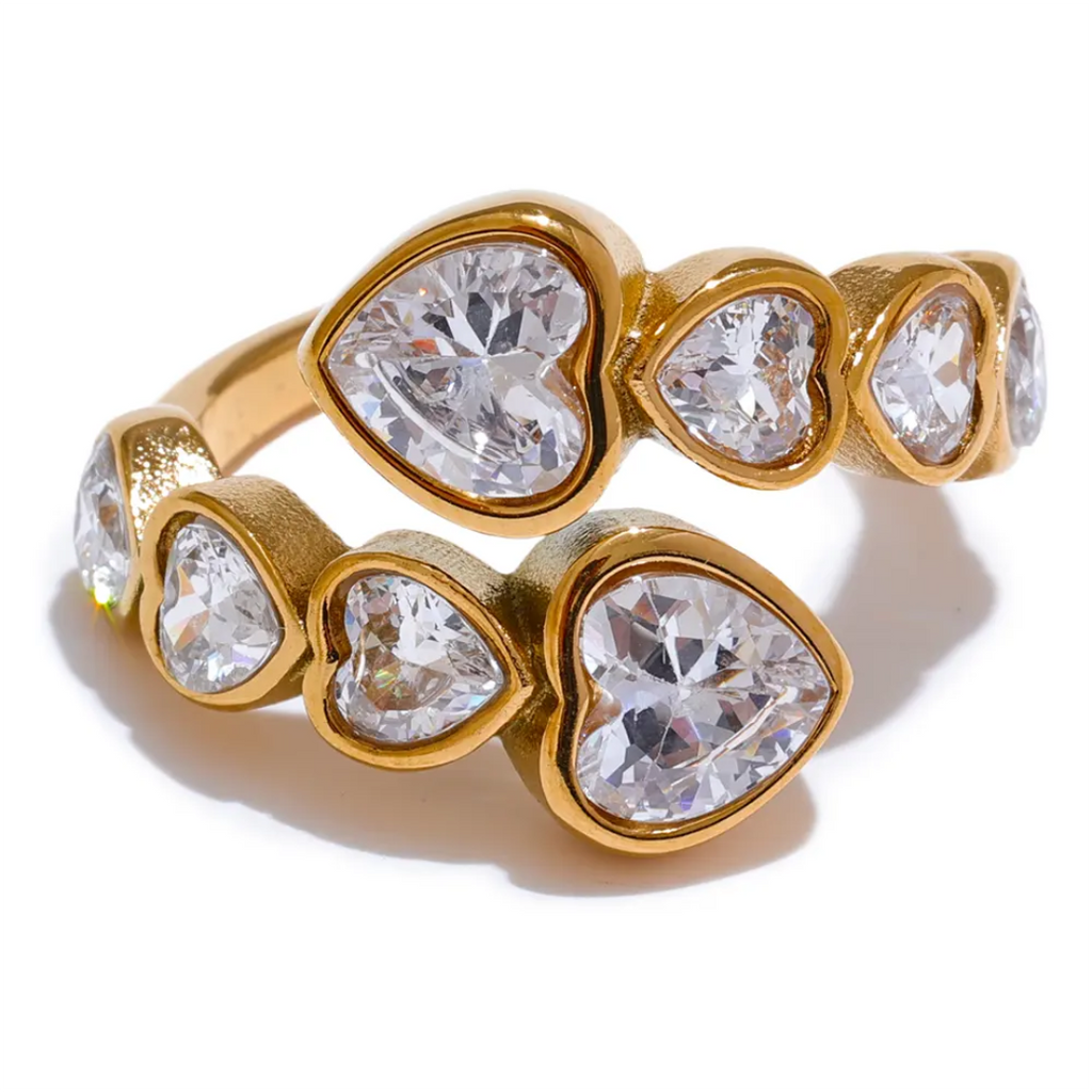 Amoure jewelry piece by Glitze Accessories featuring delicate design and shiny details, displayed on a neutral background.