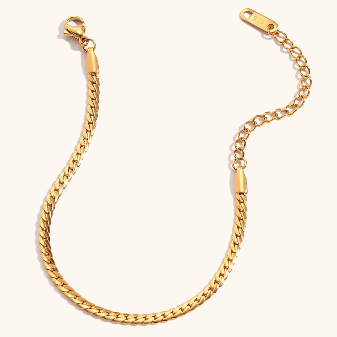 Areeka necklace by Glitze Accessories featuring a delicate chain with a pendant, displayed against a neutral background.