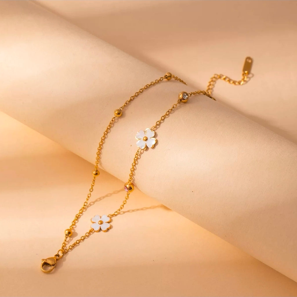 Simple Lily Bracelet by Glitze Accessories featuring delicate floral design on a silver-toned band.