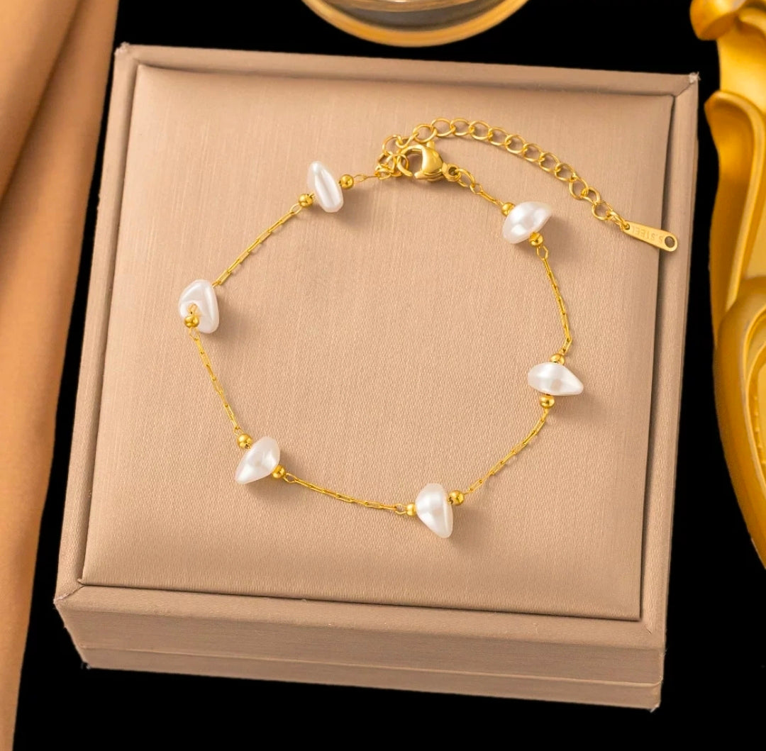 Kyra by Glitze Accessories, stylish jewelry piece featuring intricate design and sparkling embellishments, on a neutral background.