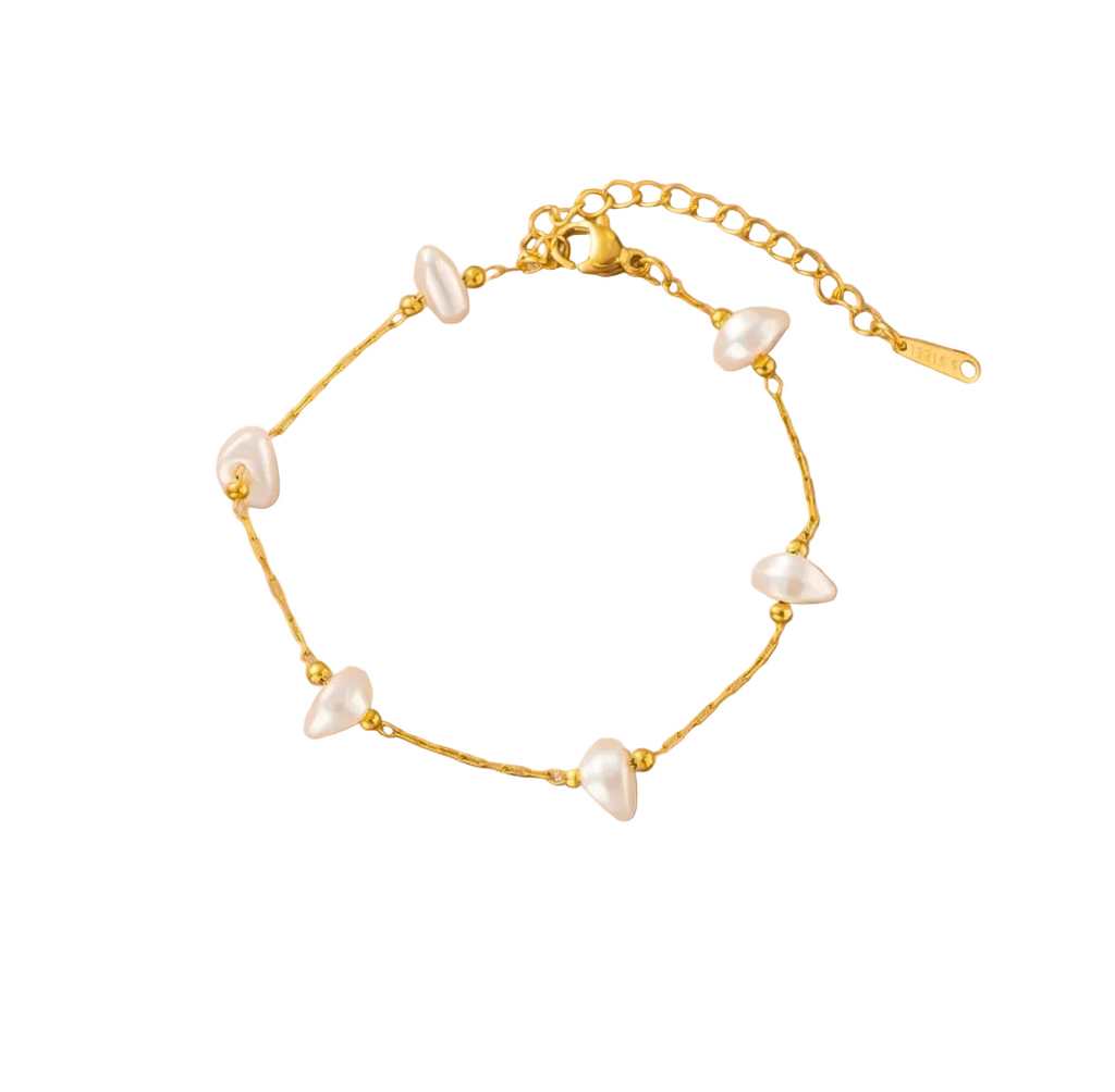 Kyra jewelry piece by Glitze Accessories featuring intricate design and shimmering details on a neutral background.